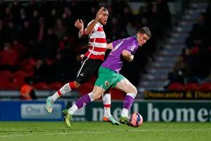 South Yorkshire Prints: Matt Smith vs Reece Wabara: Intense Clash in Doncaster Rovers vs Bristol City FA Cup Match