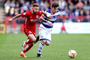 Matt Taylor Dashes Past Ryan Manning: Intense Moment from Bristol City vs. Queens Park Rangers Championship Clash