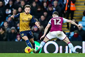Aston Villa V Bristol City Prints: Matt Taylor vs James Chester: Intense Battle at Villa Park - Aston Villa vs Bristol City