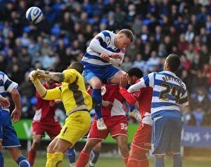 Images Dated 13th March 2010: Matthew Mills Clears the Way: Reading vs. Bristol City, Championship Clash at Madejski Stadium