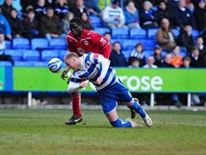 Images Dated 13th March 2010: Matthew Mills Fouled by John Akinde: Reading vs. Bristol City Championship Clash, March 13, 2010