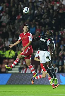 Southampton V Bristol City Prints: Maya Yoshida Wins Aerial Battle Against Jay Emmanuel-Thomas in Southampton vs