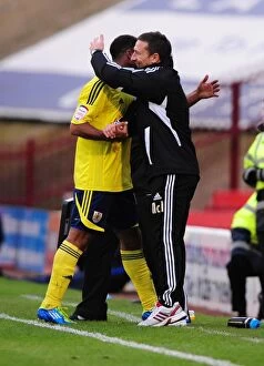 Images Dated 29th October 2011: McInnes First Win: Embracing Maynard's Championship Goal (2011)