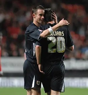 Michael McIndoe congratulates goalscorer Gavin Williams
