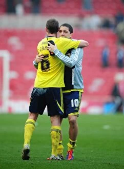 Images Dated 24th March 2012: Middlesbrough vs. Bristol City: A Moment of Camaraderie - Louis Carey and Hogan Ephraim Embrace