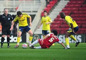 Middlesbrough v Bristol City Collection: Middlesbrough's Merouane Zemmama Tackles Neil Kilkenny in Football Match vs. Bristol City (2012)