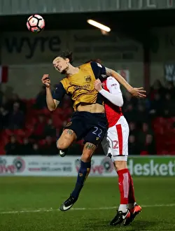 Fleetwood Town V Bristol City Prints: Milan Djjuric of Bristol City Clashes with Cian Bolger of Fleetwood Town in FA Cup Third Round Replay