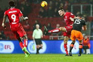 Images Dated 31st January 2017: Milan Djuric vs Tom Lees: Intense Clash in Bristol City vs Sheffield Wednesday Championship Match