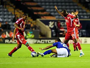 Leicester City V Bristol City Prints: Neil Danns vs. Marvin Elliott and Kalifa Cisse: Intense Battle in Leicester City vs