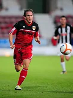 Pre Season Prints: Neil Kilkenny in Action: Bristol City vs Dunfermline Athletic