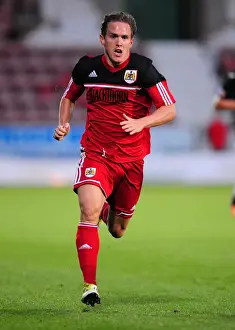 Pre Season Prints: Neil Kilkenny in Action: Bristol City's Pre-Season Friendly Against Dunfermline Athletic