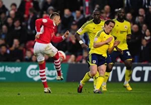 Images Dated 7th April 2012: Neil Kilkenny Blocks Radoslaw Majewski's Shot: Nottingham Forest vs. Bristol City Football Rivalry