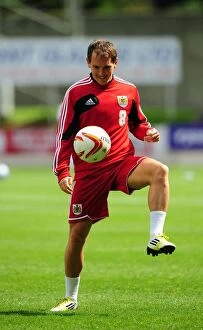 Images Dated 28th July 2012: Neil Kilkenny of Bristol City in Action Against St Johnstone at McDiarmid Park, Perth (2012)
