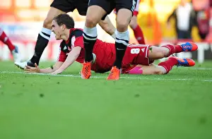 Bristol City V Charlton Prints: Neil Kilkenny Fouls Johnnie Jackson in Championship Clash: Bristol City vs Charlton Athletic