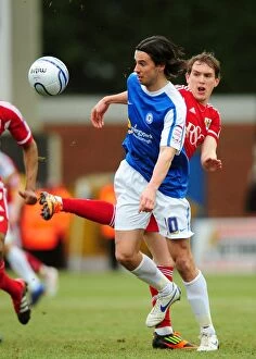 Images Dated 18th February 2012: Neil Kilkenny vs George Boyd: Battle for the Ball in Peterborough United vs Bristol City Football