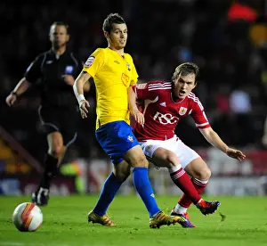 Bristol City V Southampton Prints: Neil Kilkenny vs Jack Cork: A Championship Battle for the Ball - Bristol City vs Southampton
