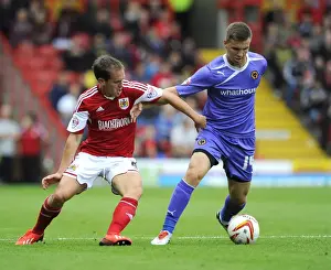 Bristol City V Wolves Prints: Neil Kilkenny vs. Lee Evans: Intense Battle for Ball Possession in Bristol City vs. Wolves