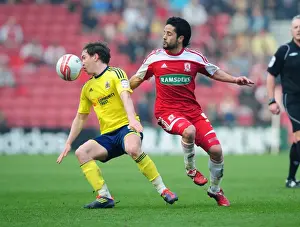 Neil Kilkenny vs. Merouane Zemmama: Battle for the Ball in Middlesbrough vs. Bristol City Football Match, March 2012