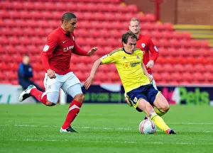 Barnsley V Bristol City Prints: Neil Kilkenny vs. Nathan Doyle: Battle for the Ball in Barnsley v Bristol City Championship Match