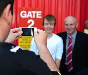 Images Dated 22nd April 2010: New Manager Steve Coppell Embraces Ecstatic Bristol City Fans at Ashton Gate Stadium, 2010