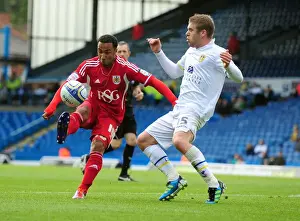Leeds United V Bristol City Prints: Nicky Maynard Flips Over Leeds Adam Clayton in League Cup Clash: Bristol City vs