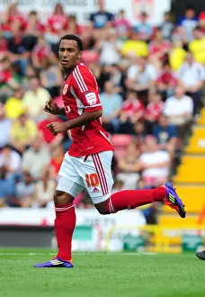 Season 11-12 Prints: Nicky Maynard Strikes for Bristol City Against West Brom in Championship Clash at Ashton Gate