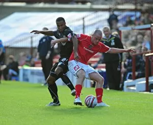 Images Dated 24th October 2009: Nicky MAynard tussles with Ian Hume