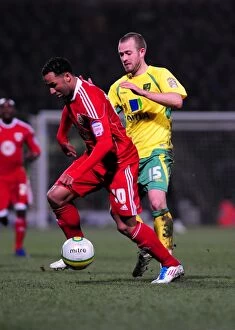 Images Dated 14th March 2011: Nicky Maynard vs. David Fox: Battle for Supremacy in the Championship Clash between Norwich City