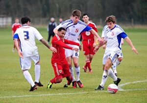 Images Dated 9th February 2011: Nicky Maynard's Determined Battle for Possession Against Swindon Defense