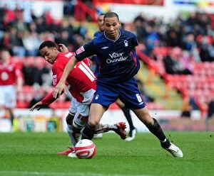 Bristol City v Nottingham Forest Collection: Nicky Maynard's Pivotal Slip Past Kelvin Wilson: A Moment to Remember in the 2010 Championship