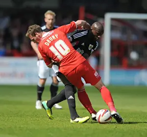 Crawley Town V Bristol City Prints: Nosworthy vs Drury: Intense Battle for the Ball in Crawley Town vs