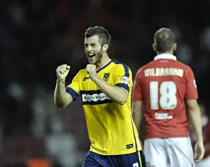 Capital One Prints: Oxford United Celebrate Upset Win Against Bristol City in Capital One Cup