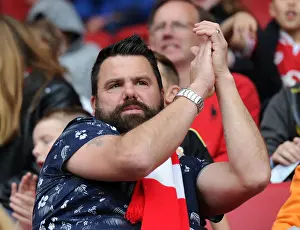 Passionate Bristol City Fan Cheers on Team at Ashton Gate
