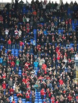 Images Dated 13th March 2010: Passionate Bristol City Fans in Full Swing at Reading vs. Bristol City Match