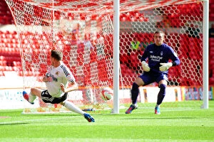 Images Dated 18th August 2012: Paul Anderson's Frustrating Cross Goes Unclaimed: Nottingham Forest vs. Bristol City, 2012
