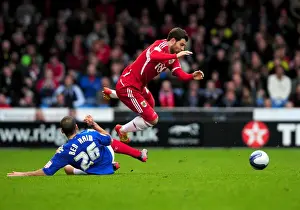 Portsmouth V Bristol City Prints: Portsmouth vs. Bristol City: Aaron Hollaway Foul by Tal Ben Haim