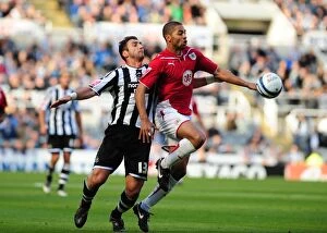 Newcastle Utd V Bristol City Collection: Powerful Duo: Khizanishvili and Saborio Unleashed - Newcastle Utd vs. Bristol City