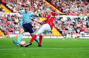 Bristol City v Hull City Collection: Ryan McGivern Crosses the Ball in Championship Match between Bristol City