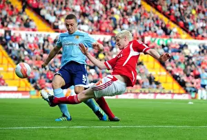 Bristol City V Hull City Prints: Ryan McGivern's Cross: Championship Clash Between Bristol City and Hull City at Ashton Gate Stadium on 24/09/2011