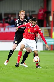 Ryan Taylor Stands Firm Against Kevin Mellor's Pressure in Bristol City vs Crewe Alexandria Football Match