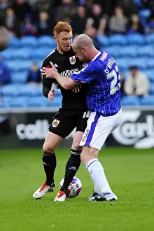 Carlisle United V Bristol City Prints: Ryan Taylor vs. Sean O'Hanlon: Intense Clash in Carlisle United vs