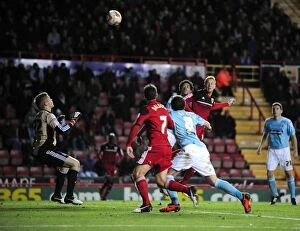 Images Dated 27th October 2012: Ryan Taylor's Dramatic Header Hits the Bar for Bristol City against Hull City, 2012