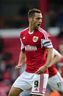 Sam Baldock's Triumphant Roar: Bristol City's Goalscorer Celebrates Against Colchester United (September 2013)