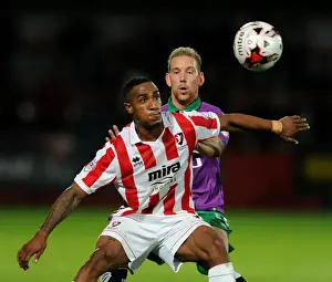Framed Print : Scott Wagstaff Chases Down Craig Braham-Barrett in Johnstone's Paint Trophy Clash: Intense Moment at Abbey Business Stadium