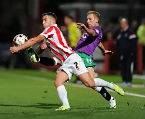 Cheltenham Town V Bristol City Prints: Scott Wagstaff Chases Down Lee Vaughan in Intense Johnstone's Paint Trophy Clash