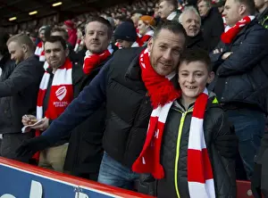 Sea of Scarves: Unified Bristol City Fans at Ashton Gate during FA Cup Fourth Round Match against West Ham United