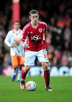 Images Dated 25th February 2012: Sean Davis Joins the Ranks: His First Match for Bristol City Against Blackpool at Ashton Gate
