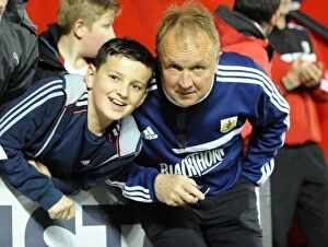 Images Dated 22nd October 2013: Sean O'Driscoll and Young Fan: A Moment of Connection at Ashton Gate - Bristol City vs Brentford