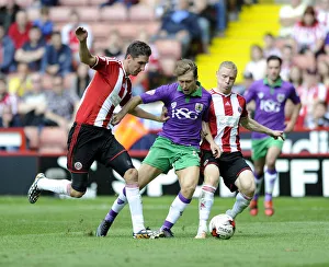Sheffield United vs. Bristol City: Intense Battle Between Luke Freeman and New Signings Chris Basham and Craig Alcock