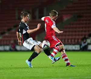 Framed Print : Southampton's Steven Davis Blocks Joe Bryan's Shot in Southampton V Bristol City, Capital One Cup